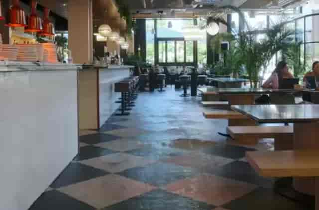 Modern event space at Mare Street Market with communal tables for networking and conferences.