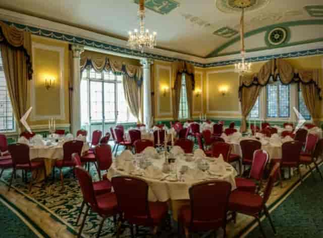 The Old Ship Hotel ballroom, featuring elegant chandeliers, for corporate banquets and gala dinners.