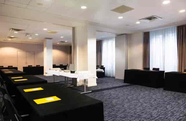 Voltaire conference room at Crowne Plaza Paris: classroom-style meeting space with catering station.