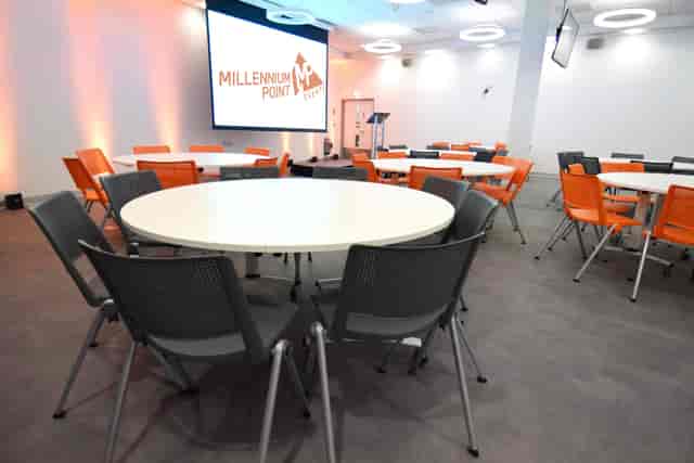 Modern banquet meeting room at New Life Wesleyan Church for corporate events and presentations.