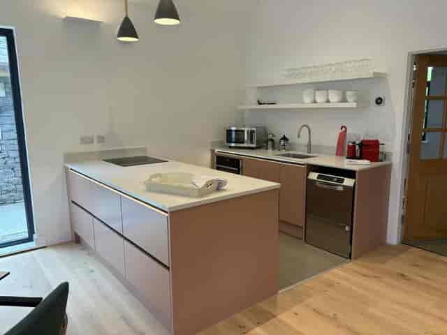 Modern kitchenette in Crosscrake Community Hub, ideal for breakout sessions and event catering.