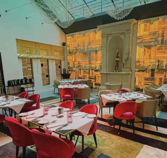 Luxury velvet seating at Fauchon L’Hôtel Paris Tea Garden for VIP events and upscale functions.