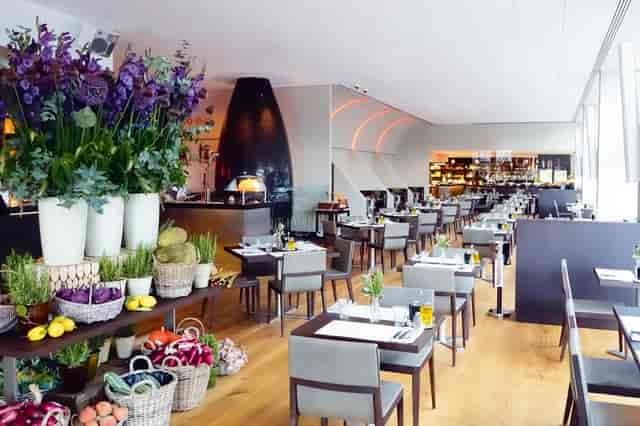 Modern Cafe at ANIMA for corporate luncheons and networking events with organic decor.
