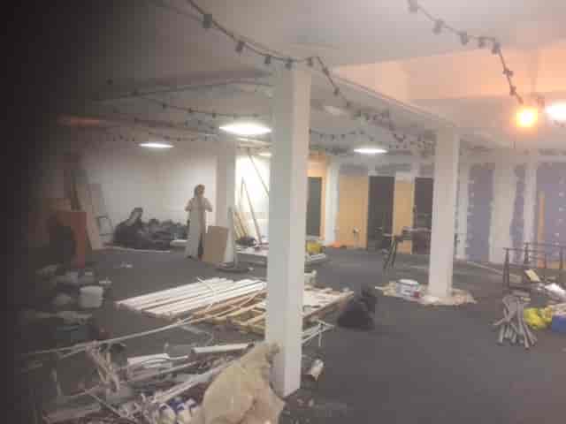Renovation-in-progress meditation center for mindful therapy event venue site inspection.
