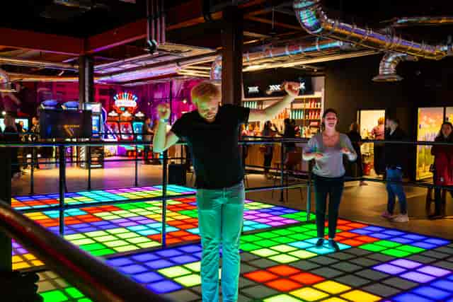 Lively Gravity Westfield venue with illuminated dance floor for events and celebrations.