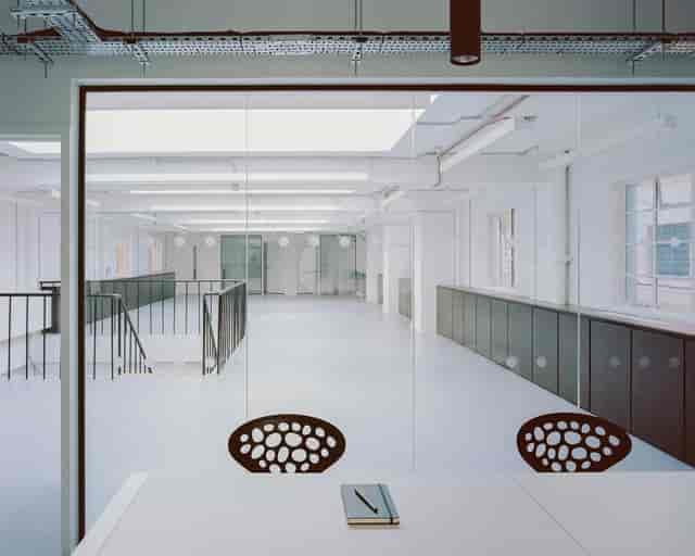 Minimalist Black Seed venue for corporate workshops and professional meetings.