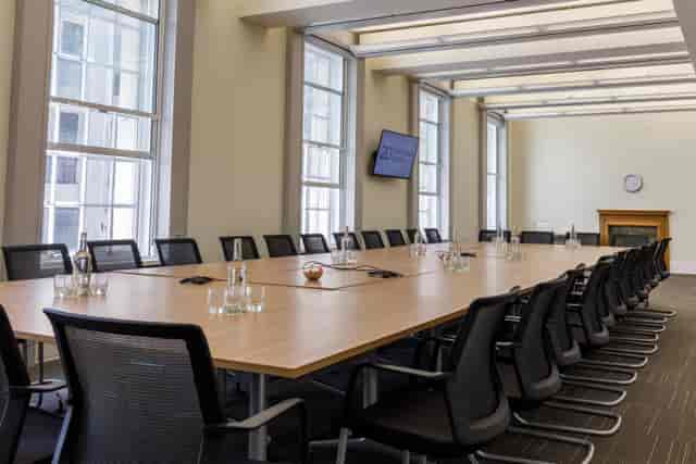 Conference room with large table and natural light in 20 Cavendish Square for corporate events.