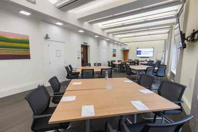 Peggy Nuttall in a collaborative meeting room at 20 Cavendish Square for workshops.