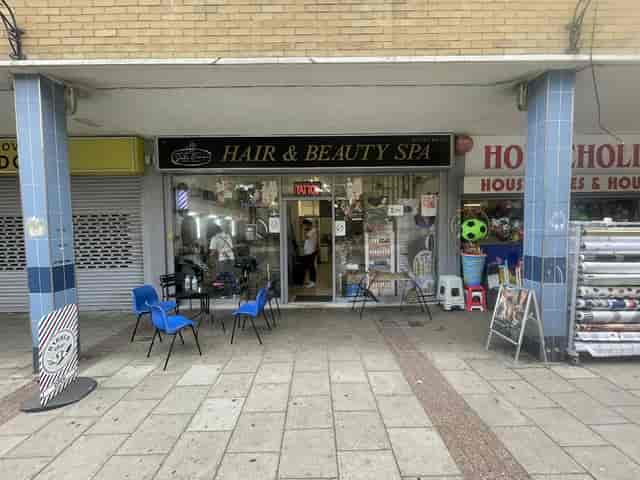 Suli Divine outdoor salon breakout area lacking ADA compliance and professional branding.