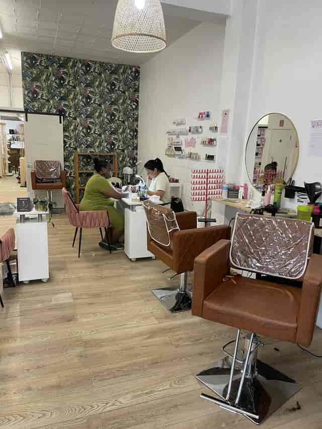 Suli Divine salon boutique with intimate high-contrast interior for personalized beauty services.