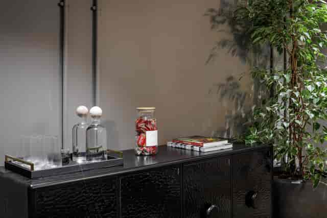 Meeting room beverage station with elegant glassware for professional events and networking.