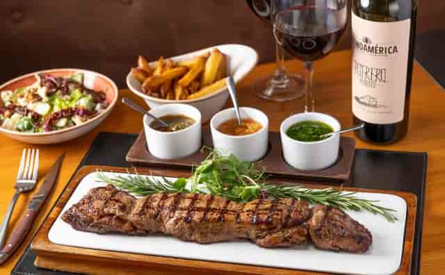 Premium steak dinner at CARNE HOVE for intimate corporate business dining.