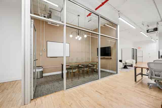 Mercer Meeting Room 402 B with glass walls, ideal for professional events and presentations.
