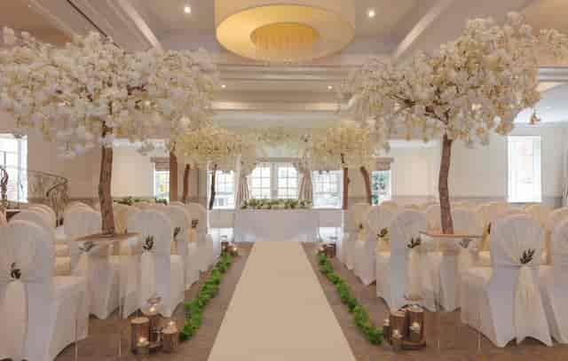 Albrighton Hall ceremony room with structural floral decor for weddings and corporate events.
