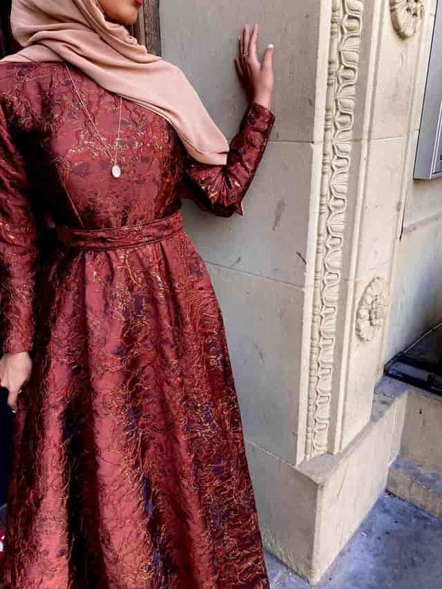 Elegant dress in a luxury showroom, perfect for upscale events and professional branding.