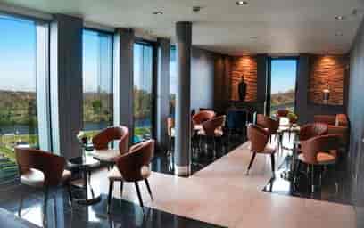 Stylish Sky Lounge at Crowne Plaza Kingston, ideal for networking events with scenic views.