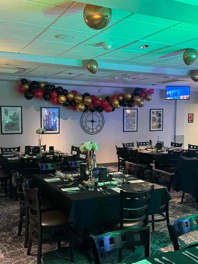 The Glindon event space with banquet tables, perfect for corporate dinners and milestone events.