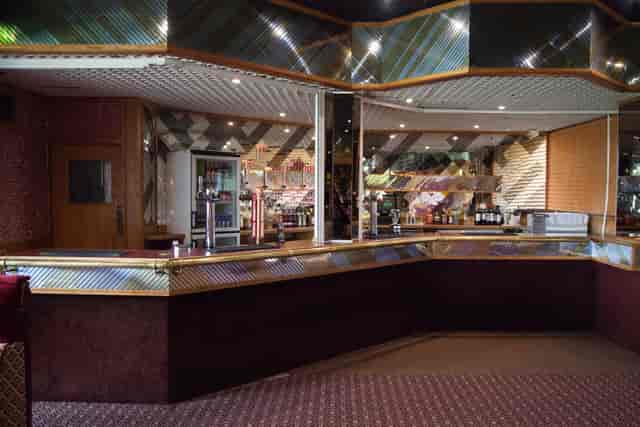 Dated bar area at Aldenham, Bushey, requiring renovation for modern event and wedding venue styling.