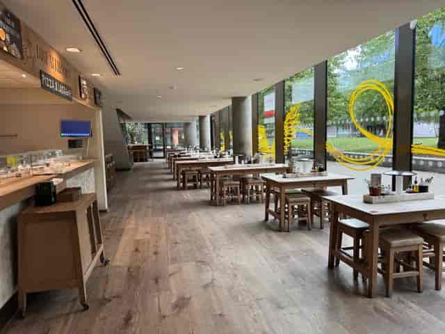 Pizza Kitchen at Vapiano - Tower Bridge, spacious dining area for casual events.