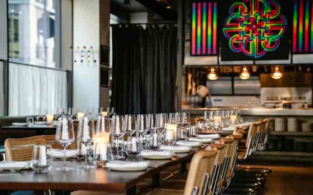 Modern long-table set up at Daffodil Mulligan for corporate dinner and networking events.
