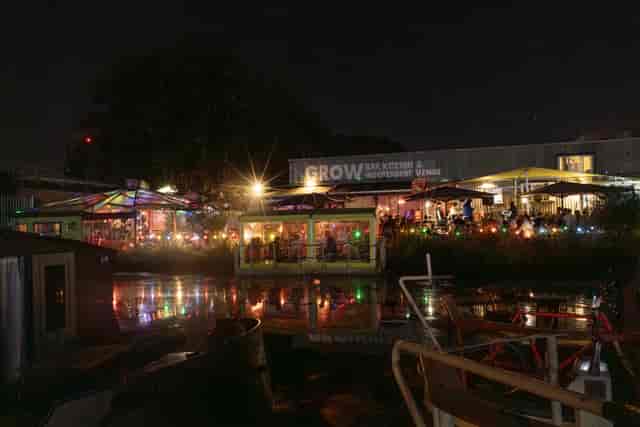 Canal-side Grow venue with organic decor, ideal for corporate networking and social events.