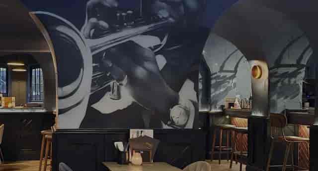 Jazz-themed mural at The Manor of Hurst venue for networking reception and VIP event hire.
