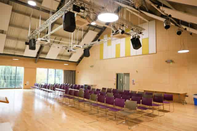 First Floor Hall: Modern plywood venue for corporate presentations and creative workshops.