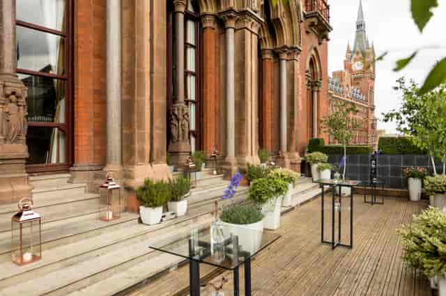 Elegant terrace at St. Pancras with greenery, perfect for cocktail receptions and events.