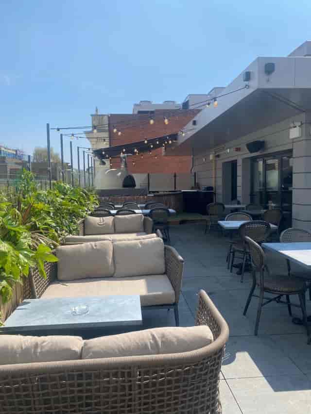 Stylish outdoor venue with lounge seating at The Botanist Exeter for events and meetings.