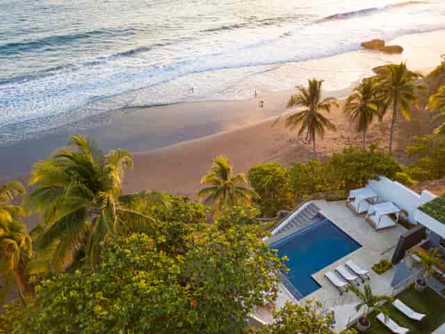 Oceanfront Beach Club at Garten Hotel - serene beachfront venue for retreats and events.