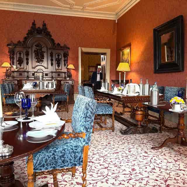 Elegant dining room at Inverlochy Castle, set for corporate events and upscale celebrations.