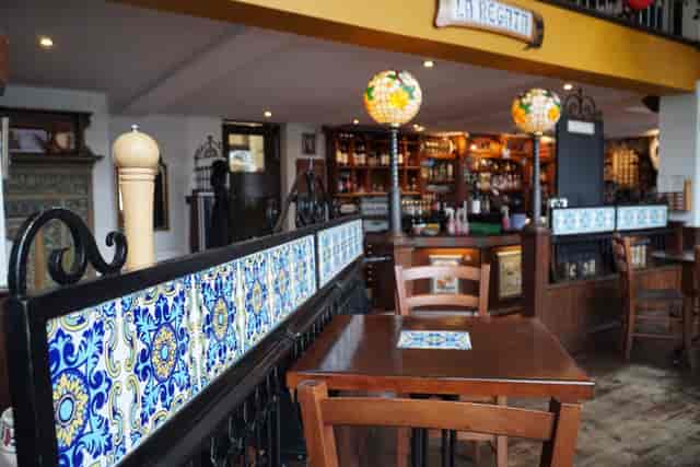 Main Restaurant at La Regata: Intimate tiled space for private events and networking mixers.