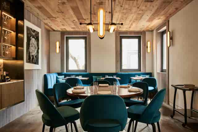 Private dining room with modern decor, ideal for intimate meetings and events.