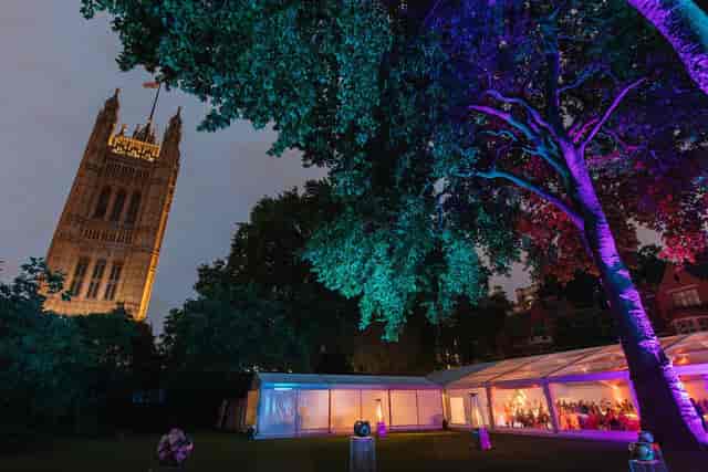 "Pavilion Gardens event space with elegant marquee and vibrant lighting in Hyde Park"
