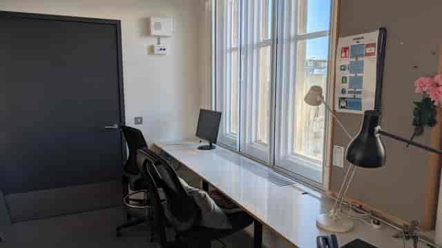 Modern minimalist office space at Bush Theatre, perfect for meetings and brainstorming.