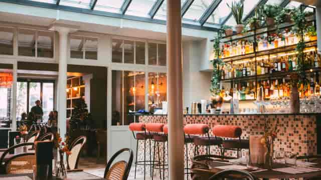 Inviting Tigermilk restaurant with cozy seating, ideal for brunch or corporate events.