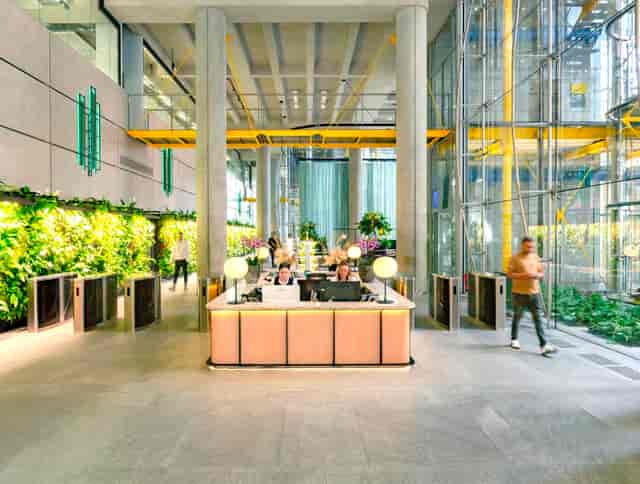 Modern reception area with lush greenery for corporate events at Together 88 Wood Street.