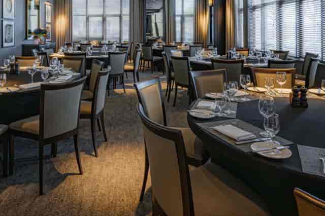 Stylish dining area in Dakota Hotels for corporate events and intimate gatherings.