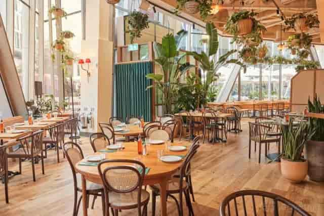 Contemporary restaurant venue hire with natural light, ideal for meetings and events.