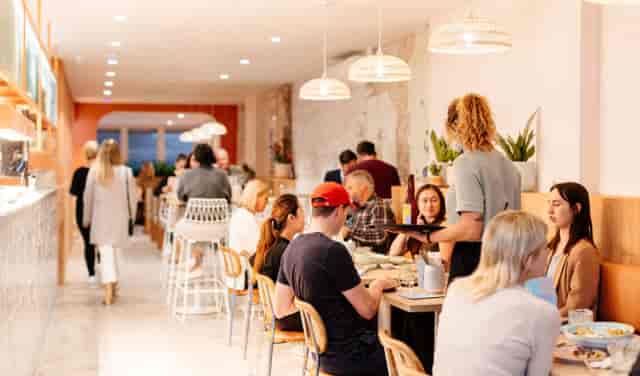 Atico in Fonda Mexican: modern restaurant with vibrant decor for networking events.