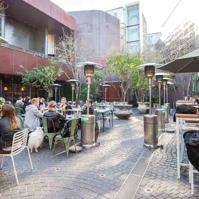 Outdoor courtyard with seating, ideal for relaxed networking events and gatherings.