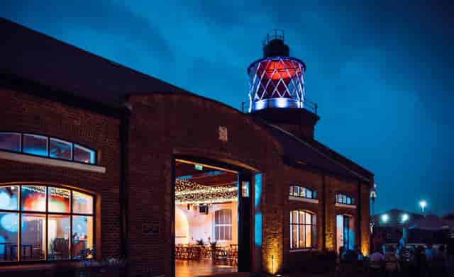 The Pier at Waterview: lighthouse silhouette for evening reception and corporate soirée.