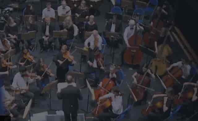 Symphony orchestra in Main Hall at Latymer Upper School for live music performance.