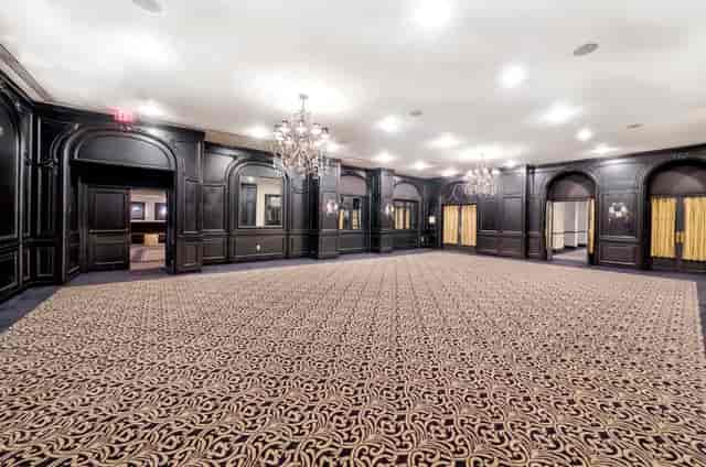 Elegant event room with chandeliers at Hotel ZaZa Houston for conferences and galas.