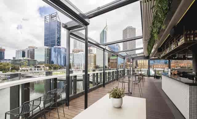 Rooftop terrace at The Reveley with skyline view for corporate events and cocktail mixers.