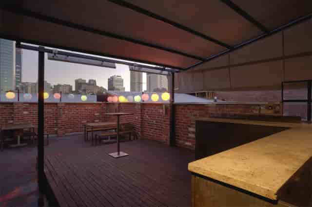 Rooftop venue at Connections Nightclub with built-in bar for networking and cocktail events.