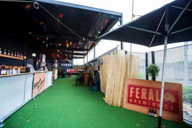 Badlands Main Room with bar service, ideal for casual corporate team building and social mixers.