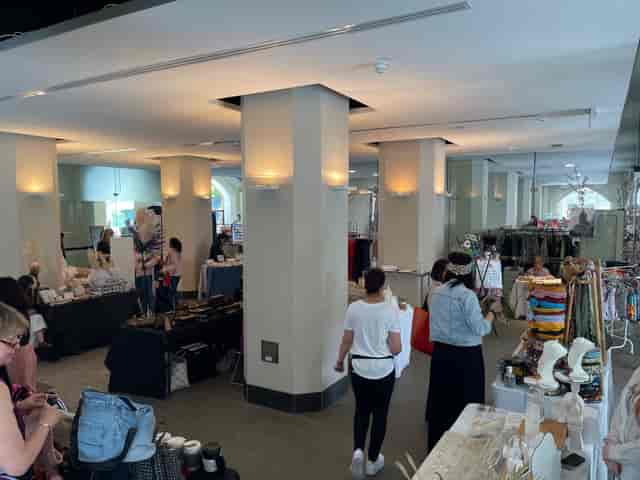 Craft fair in Perth Town Hall lower foyer with structural columns for pop-up market events.