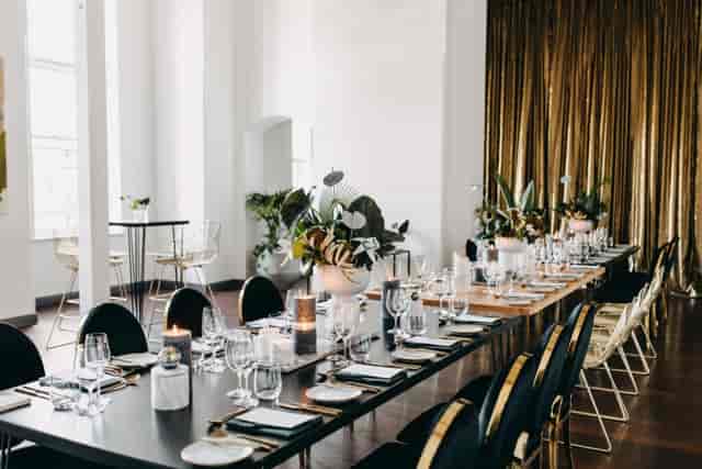 Luxury banquet table setup at The Mark, State Buildings for corporate gala or fine dining event.