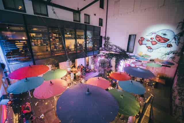 Colorful parasols at Long Chim State Buildings, ideal for cocktail receptions and networking events.